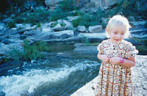 My daughter Lucy beside the river